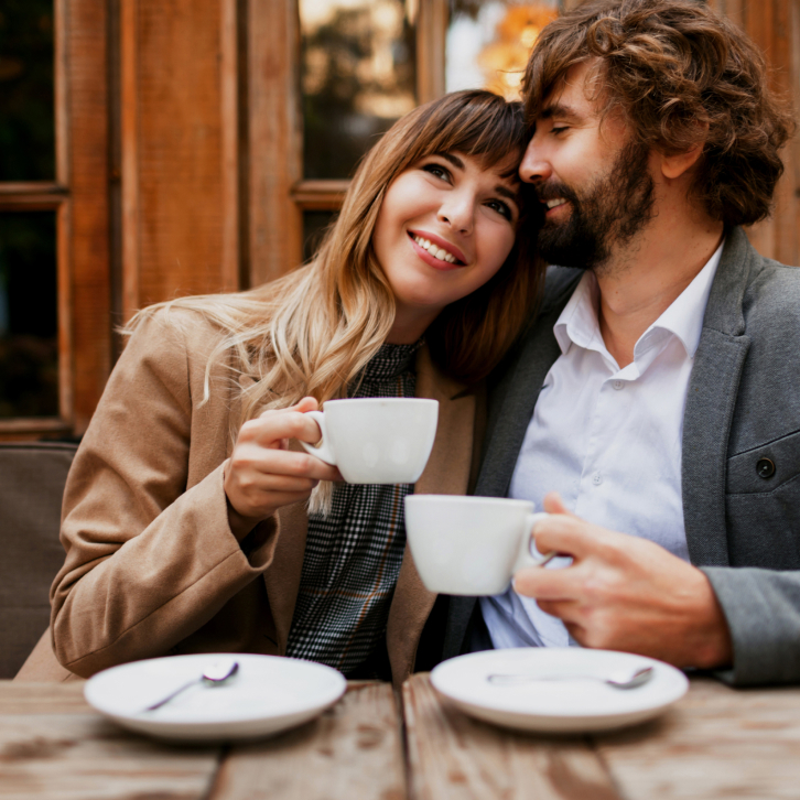 a couple with coffee